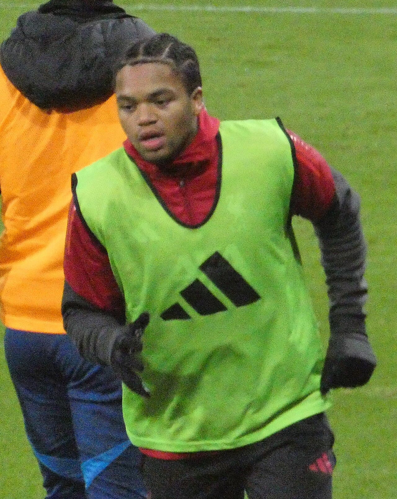 Rio Ngumoha warming up during the ongoing match between Fulham and Liverpool.