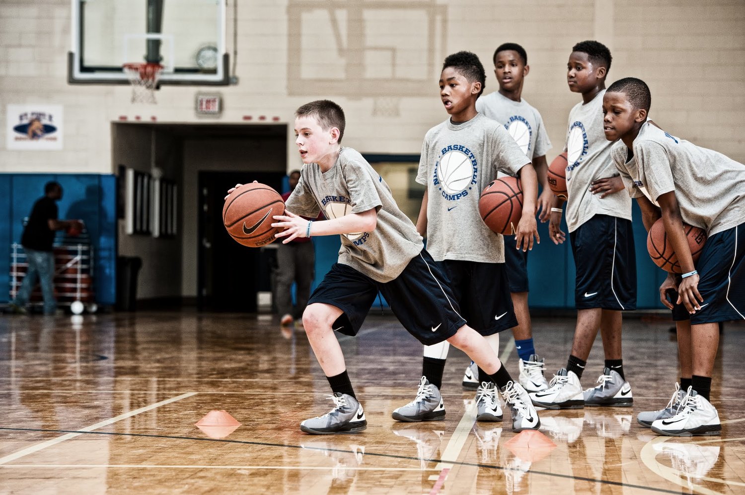 kids learning basketball