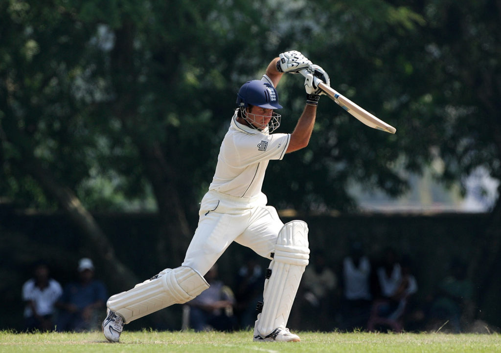 Swing the Bat Downward and hit the Ball after it Bounces